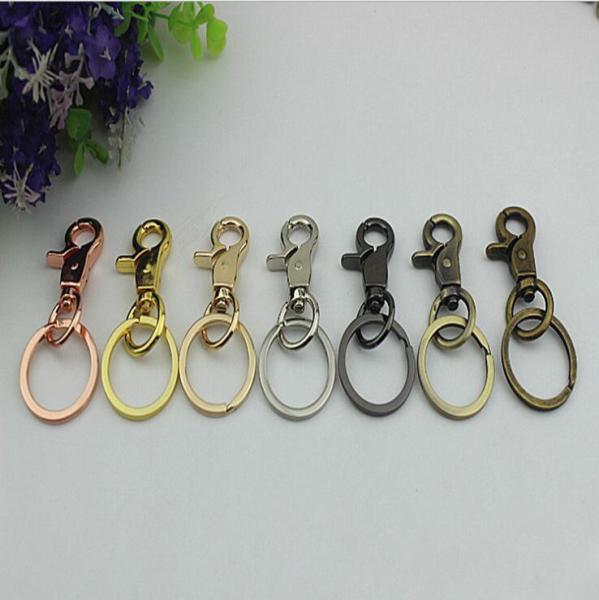 RLOVE design zinc alloy 18 mm spring trigger rose gold metal snap hook with key ring