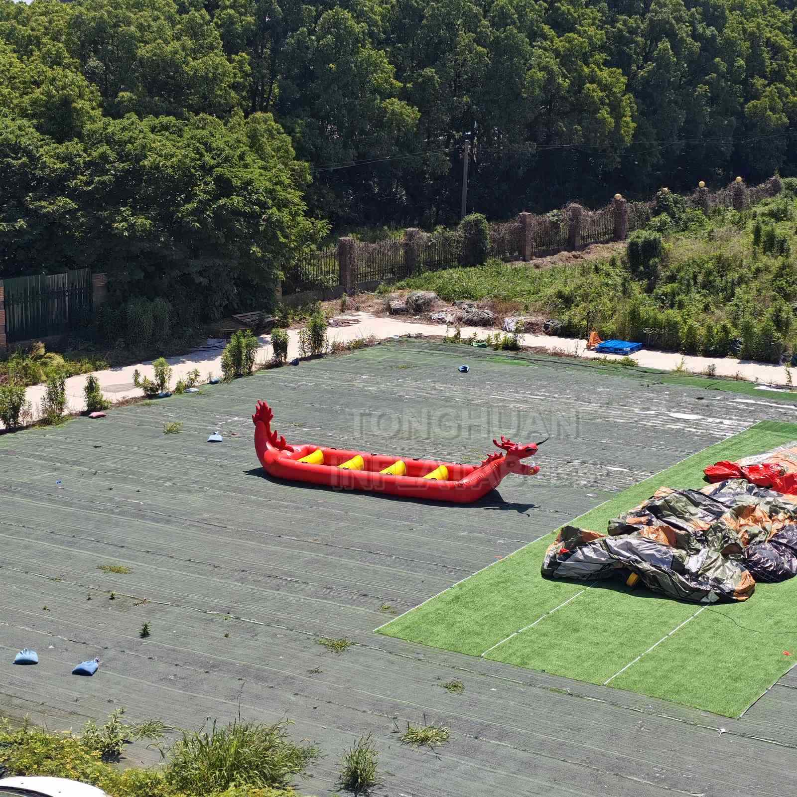 Custom Inflatable Dragon Boat with Multi Person Bench Seats Reinforced Grab Handles and Color Options for Team Racing Lake Events and Water Rentals