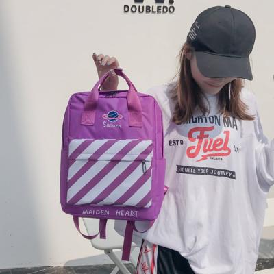 Korean embroidery star stripes handheld backpack personality of students schoolbag