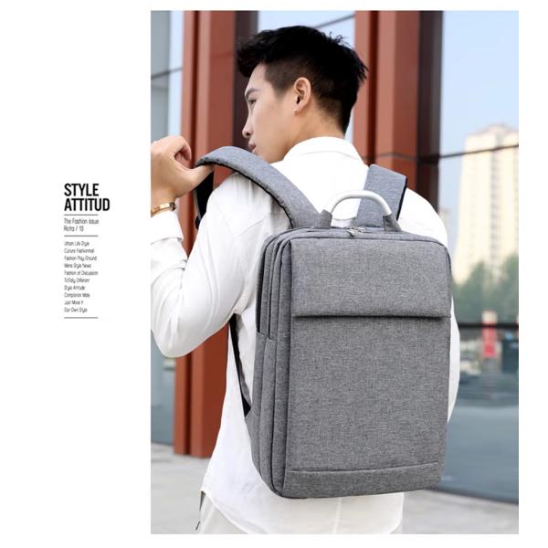 Mochila para computadora gris antirrobo con logotipo personalizable, perfecta como maletín para portátil de negocios para colegas y viajeros frecuentes