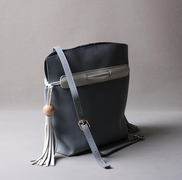 2016 summer new Korean fashion spell color tassel leather handbag drawstring shoulder bag packet header layer of skin