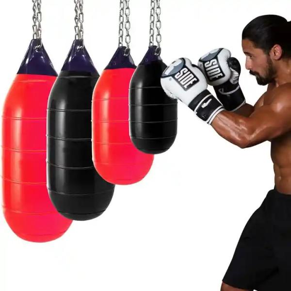 High intensity fitness workout with water or sand boxing balls