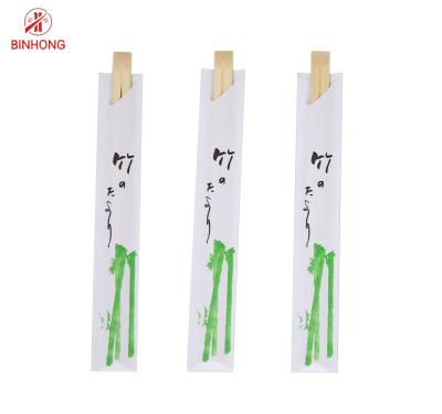 O meio papel envolveu hashis de bambu maiorias dos gêmeos de 21cm
