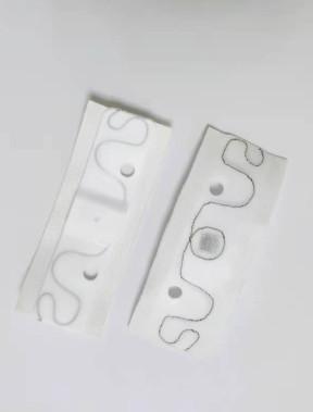 RFID silicon gel laundry tag LAU002H , RFID UHF Laundry Tag 200 Times Washing Cycles ,  RFID laundry tag with holes