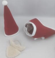 Le chien en peluche amical de planète bourré joue le jouet de Noël de chien de Santa porte