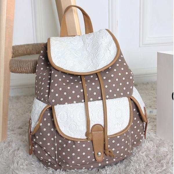 2016 new winter female European and American fashion jacquard material dot pattern lace embroidered backpack canvas bag