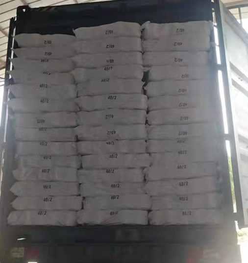 Hilo de poliéster hilado de fibra cortada Yizheng 40/2 blanco crudo para hilo de coser, grado AAA