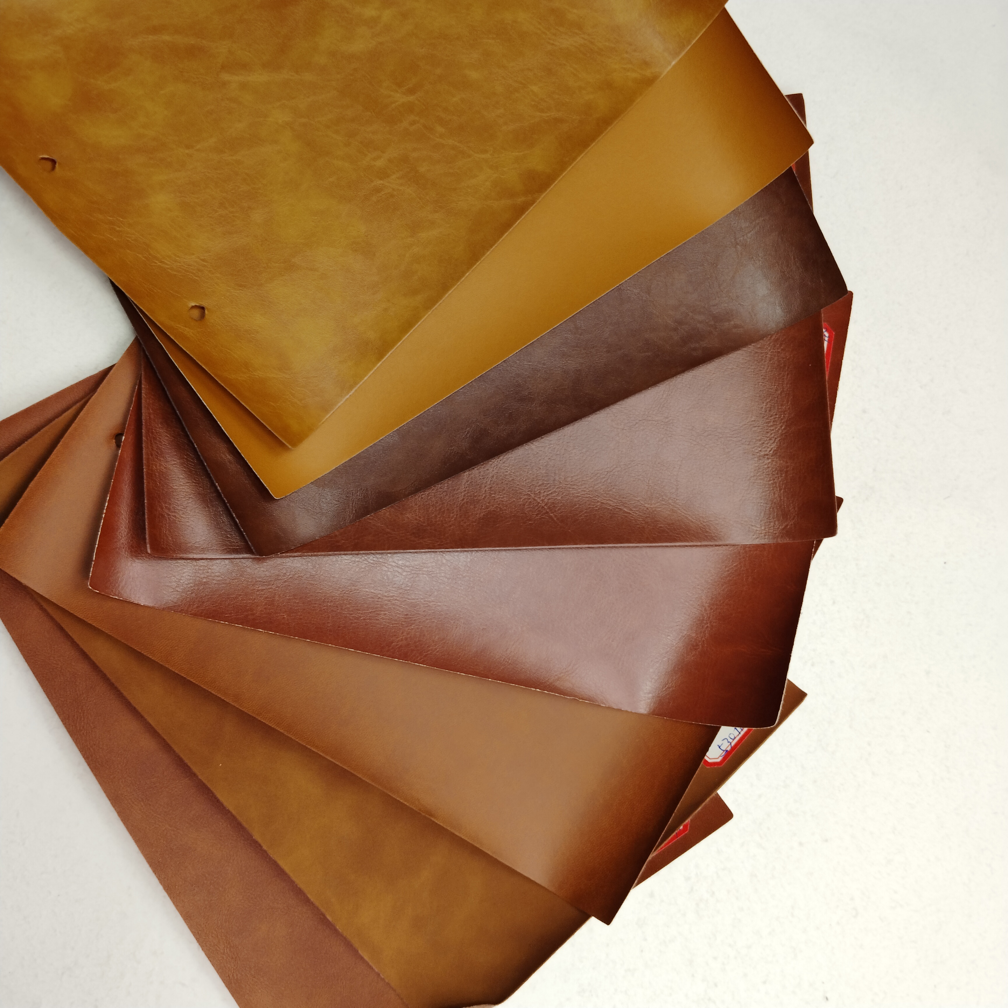 High Quality PU Printed Synthetic Thermal Suede Leather Fabric Embossed Stretch Material for Making Notebook Garment Labels