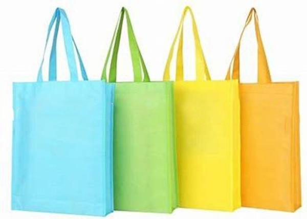 Tela não tecida de Spunbond do poliéster amigável de Eco para sacos de compras não tóxicos