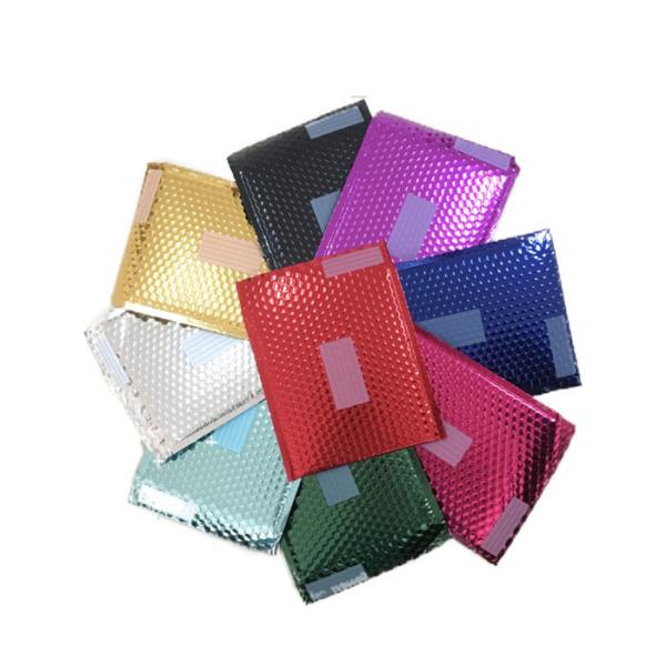 Los anuncios publicitarios metálicos coloridos de la burbuja del encanto, los sobres metálicos del envío rasgan resistente