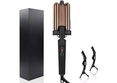 O uso da casa do encrespador grande da onda do titânio de três tambores cabelo automático do diodo emissor de luz oscila