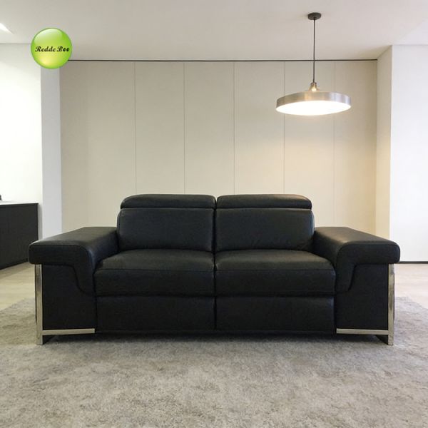 White Leather Power Reclining Sofa: Adjustable Headrest, Metal Base – Ideal for Bright Modern Living Spaces