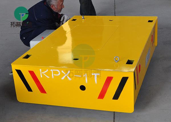 Battery powered self propelled motorized transfer trailer with intelligent charger
