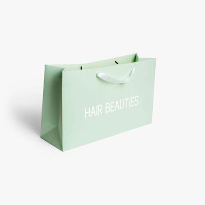 CMYK Saco de presente de compras Partone para design personalizado 250 Gsm Papel de arte Roupas embalagem
