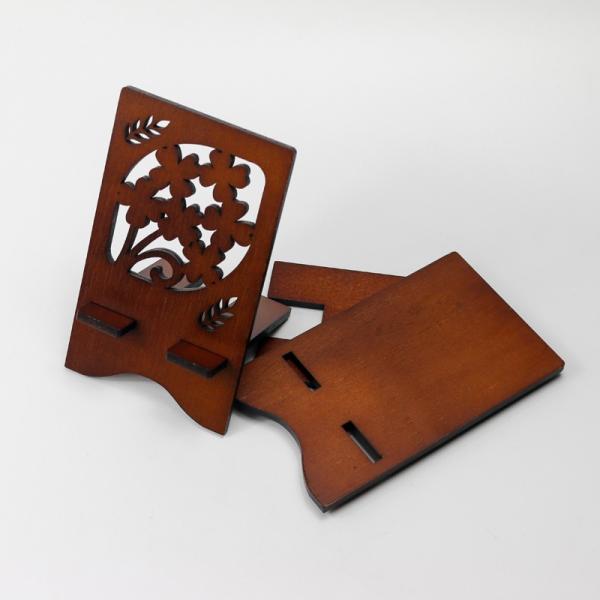 Exquis support de téléphone portable en bois sculpté