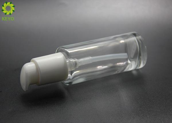 Luxury Cosmetic Packaging 80ml Round Flat Glass Serum Lotion Bottle With Self Lock Pump