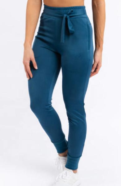 Das mulheres atléticas do Sweatpants das mulheres do esporte basculadores do treinamento