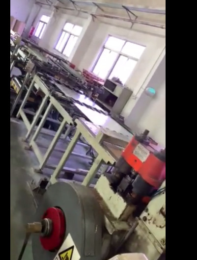 Использованная линия резки Hengli с катушкой с реставрацией отверстий