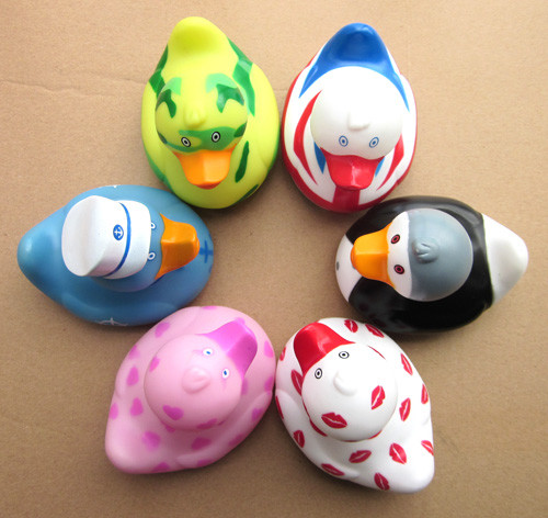 Cartoon rotocasting rubber duck vinyl toys, plastic OEM designers ducks toys
