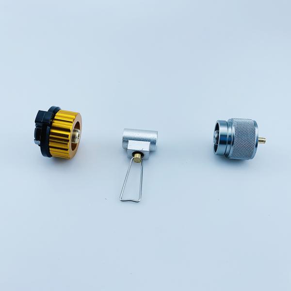 El adaptador de latón para el quemador de gas y el tanque de cilindro de butano
