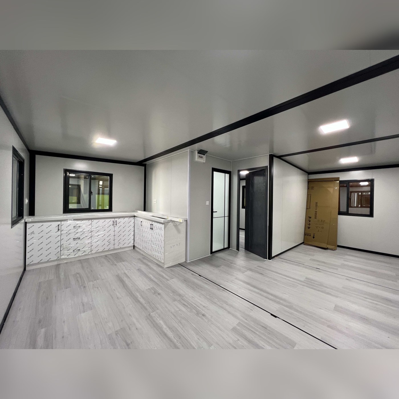 20ft Expandable Container House with Grey Cladding, Black Frame and Fitted Interior