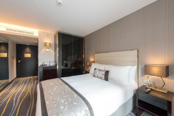 Melaka light luxury hotel room design of guestroom furniture by Stainless steel leather headboard bed with fashion table