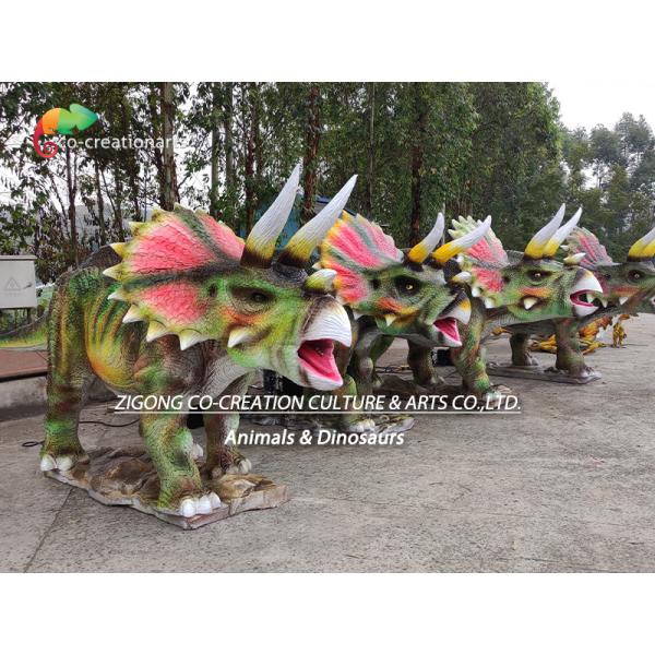 Realistic Animatronic Triceratops Trio: Vibrant Frills & Roaring Motion In Natural Setting
