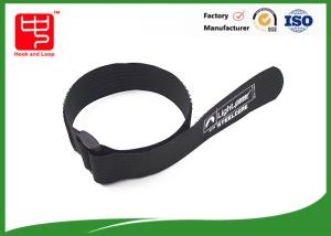 Black strap one side sticky backed , 100% nylon cable ties with buckle