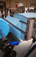 9.5KW machine à linge de lit non tissé chargement automatique poudre magnétique tension système de contrôle automatique