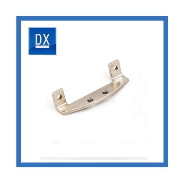 Sheet metal stamping fuel line retaining clip