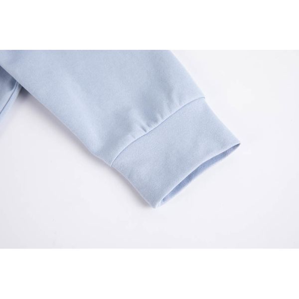 Women's Light Blue Long Sleeve Polo Top with Breathable Piqué Knit and V-Neck Placket