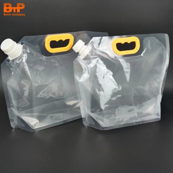 Custom Reusable Stand up Pouch With Plastic Handle With Nozzle Plastic Liquid Beverage Juice Drink Packaging Plastic Bag