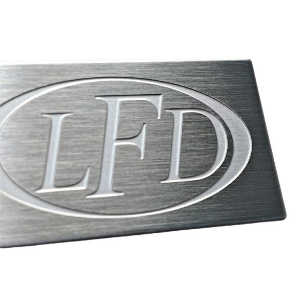 The Brushed Stainless Steel Metal Nameplate Is Customized With A Simple And Elegant Metal Logo