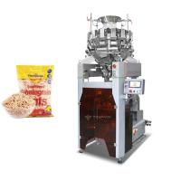 Harina de avena de aislamiento vertical de la quinoa de la máquina del cuenco de la vibración en los bolsos que pesan la empaquetadora