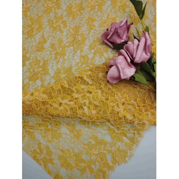 Tissu en dentelle métallique dorée à motif floral