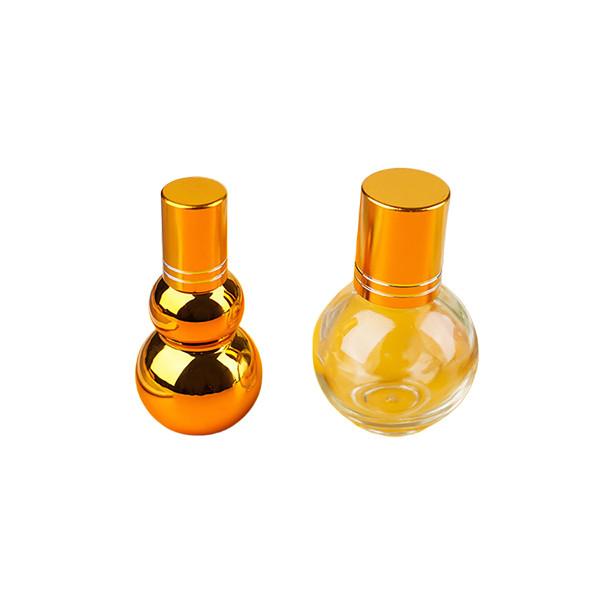 A cabaça dourada uv luxuosa dá forma ao rolo vazio nas garrafas de perfume 50ml 100ml