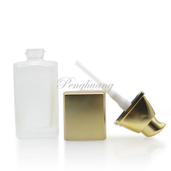 Frasco de vidro de fundação congelada 30 ml Frasco de fundação de líquido cosmético com bomba de ouro