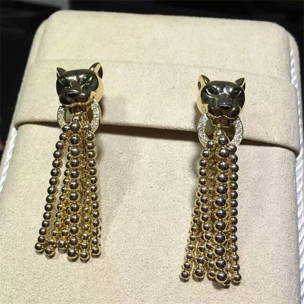 C earrings, 18K gold, inlaid with 34 round bright cut diamonds, Shafrey garnet leopard eyes, Onyx factory in China