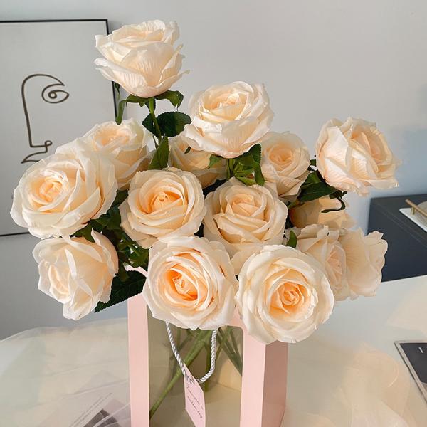 A single broken ice blue rose with a realistic touch for Valentine's Day home decoration shoot, featuring Ecuadorian roses