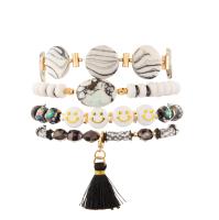 De cristal negro tallada gotea las pulseras con las gotas blancas de la rueda sonríe Emoji hecho a mano