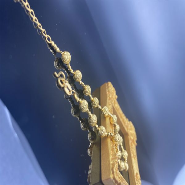 Lujoso brazalete de corazón de oro amarillo de 18K