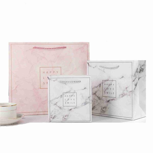 Personalised CCNB Pantone color Printed Paper Gift Bags For Clothing Jewelry Packaging