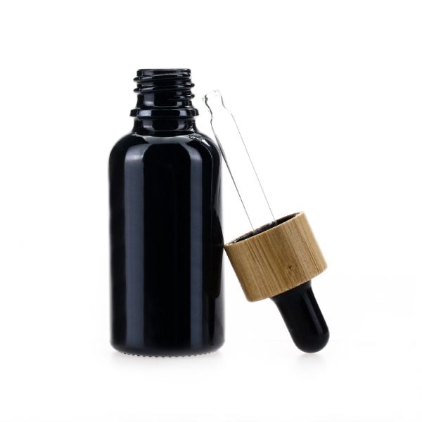 Botella de vidrio negra del dropper del aceite de 30ml 1oz con el tapón de tuerca de aluminio