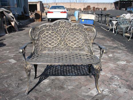 Modern Cast Iron Table And Chairs With Antique Bronze Color Cast Iron Outdoor Dining Set