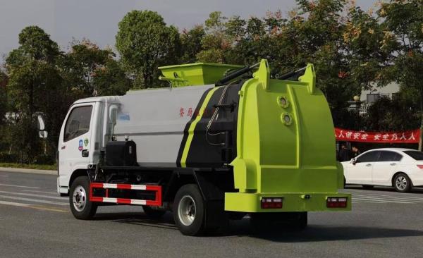 No Problem Pure Electric Dongfeng 4x2 Lifter Truck Efficiently Handles 6CBM Kitchen Garbage Containers