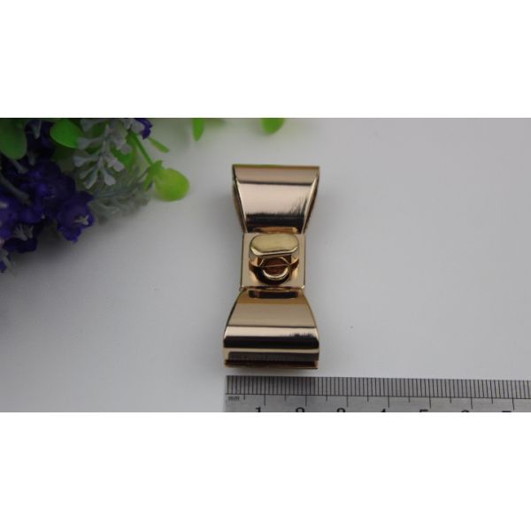 Hanging plating zinc alloy fashion gold metal bow-knot pattern small purse turn locks