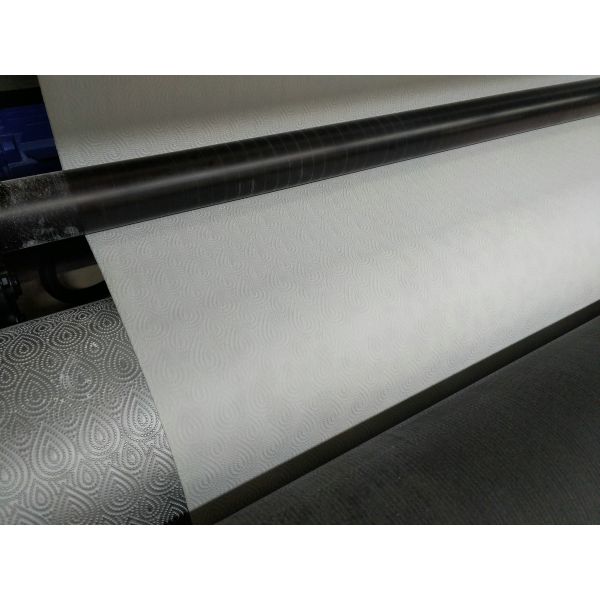 Machine à rembobiner les rouleaux de papier toilette et d'essuie-tout