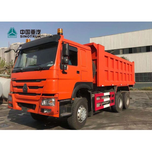 самосвал Синотрук Хово 6кс4 покрышки 20КБМ 13Р22.5 безламповый для Ганы в апельсине