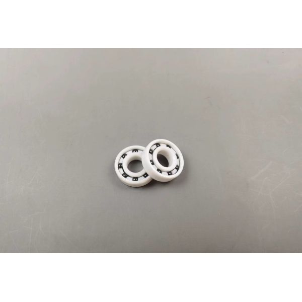 Las bolas PTFE del rodamiento de bolitas del nitruro de silicio ZrO2 Si3N4 enjaulan 6001 12m m