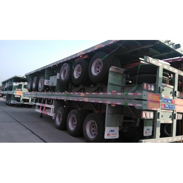 Long Distance Transportation 4 Axles Heavy Duty Flatbed Semi Trailer Truck and 12 Twist Locks